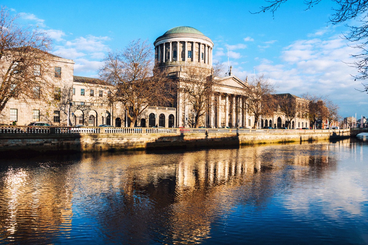 The dome of the Four Courts reflected in the Liffey